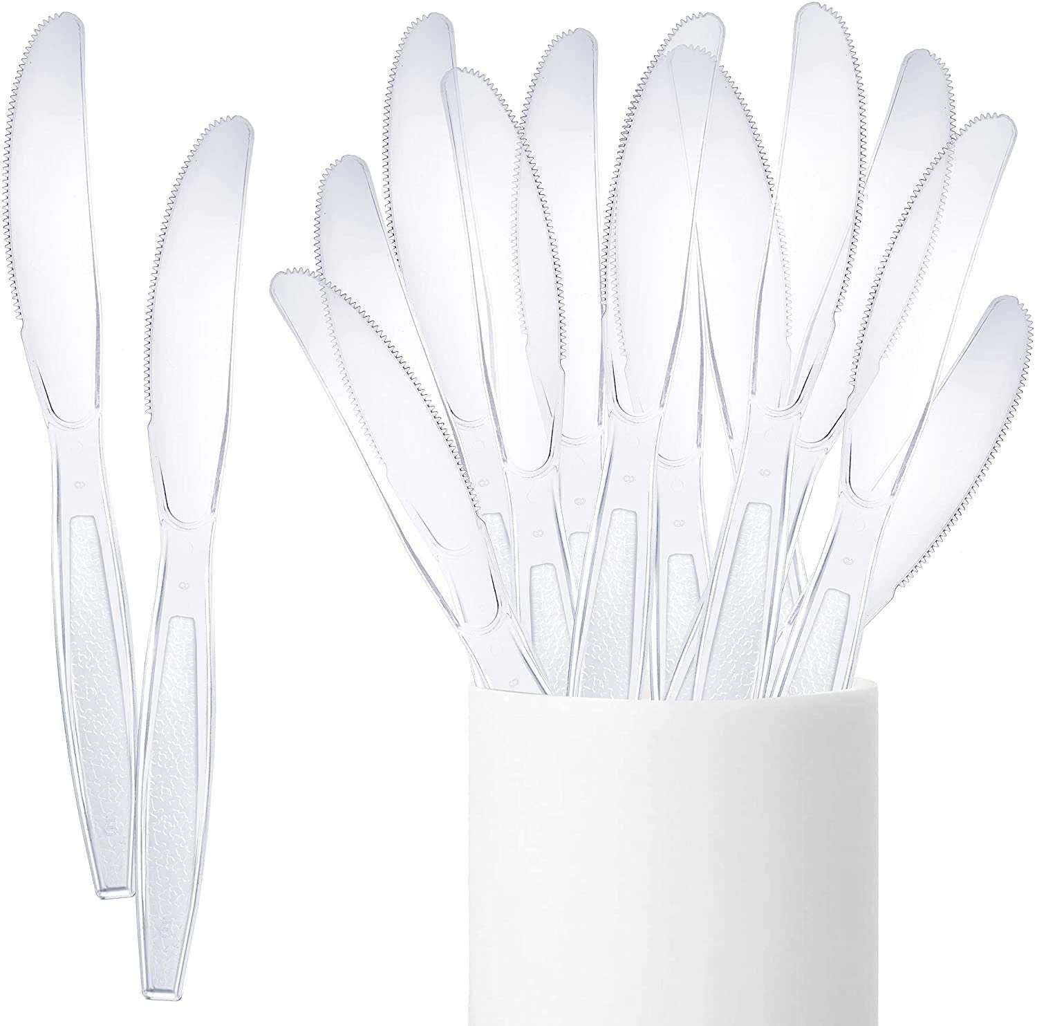 Heavyweight disposable clear plastic cutlery displayed in a storage box.